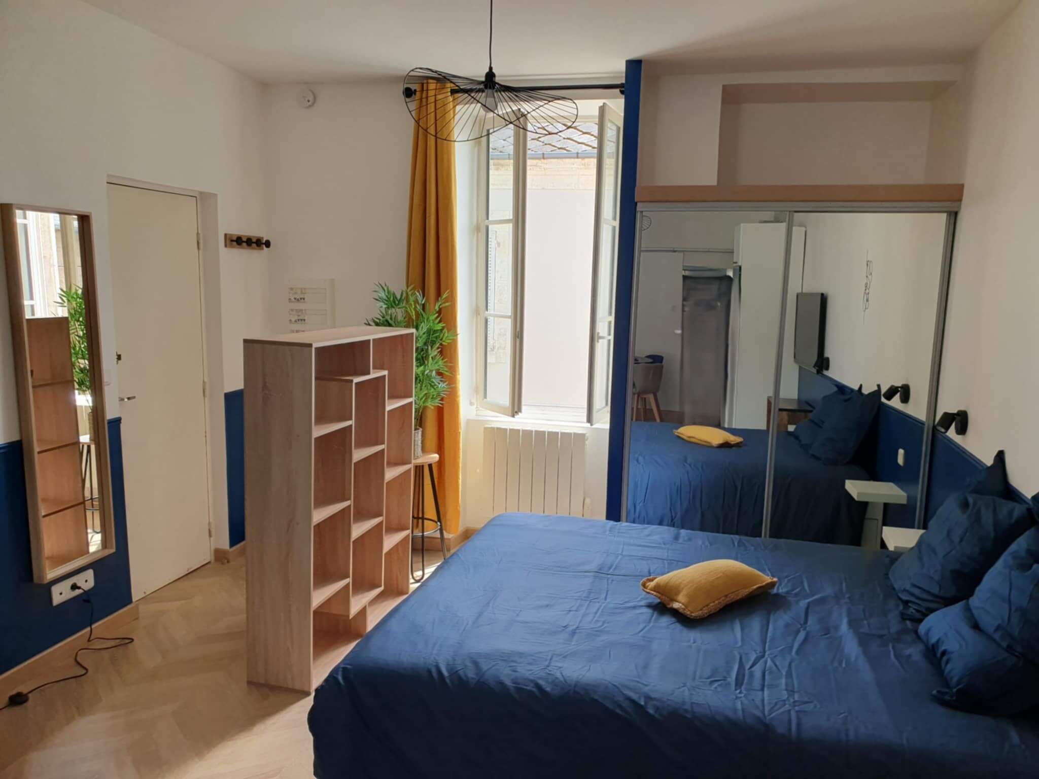 aménagement studio investissement locatif,aménagement studio rentable,décoration investissement locatif,studio location meublée design,optimisation studio,valorisation bien immobilier,studio attractif locataires